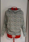 Women’s long sleeve, funnel neck top.